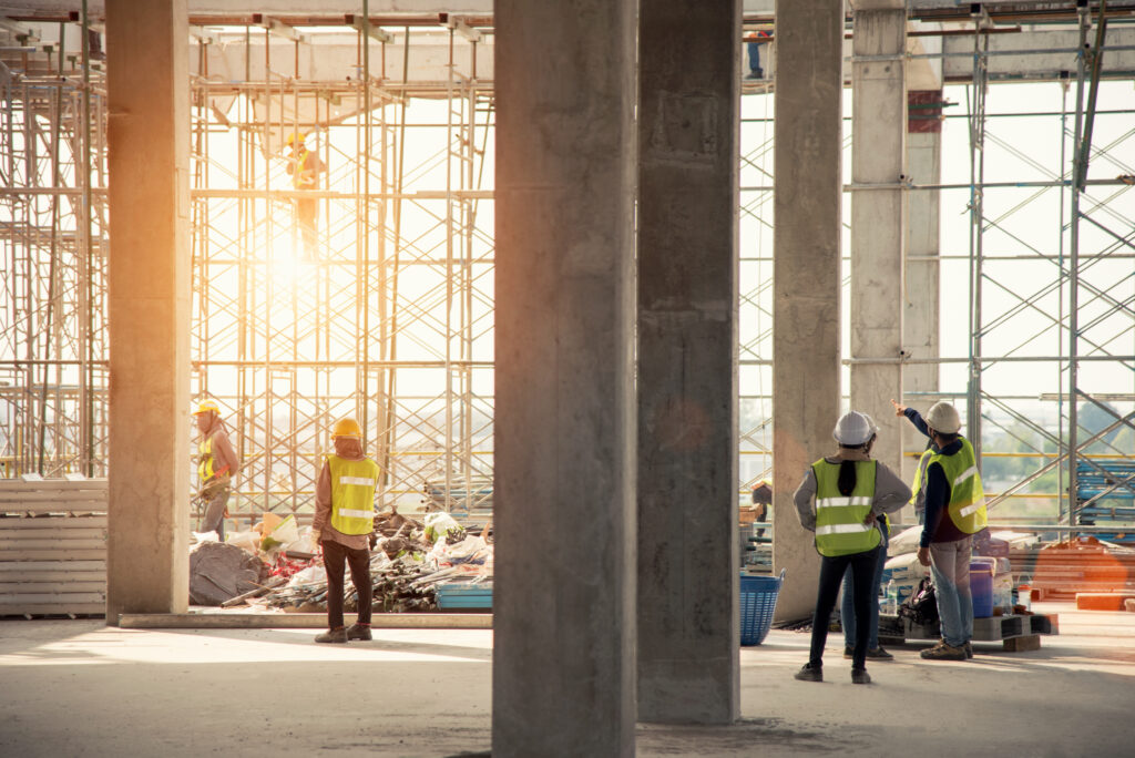 workers performing quality control in construction